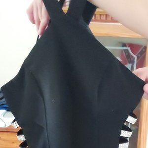 Black homecoming dress with slits on each side.